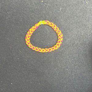 I am selling a pink and neon yellow bracelet